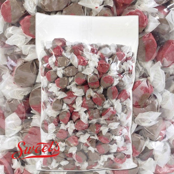 Clear bulk bag of wrapped red and brown Sweet's Cherry Cola taffy over a close-up of the pieces with the Sweet's logo