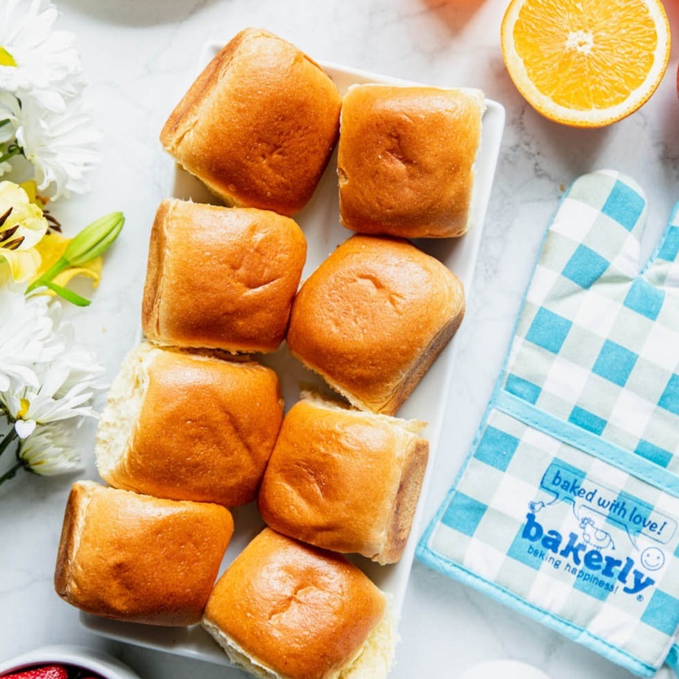 Bakerly Brioche Dinner Rolls styled on a table