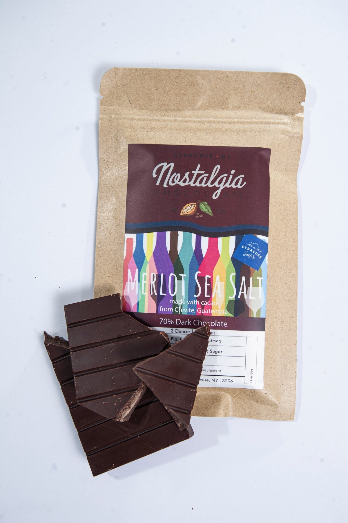 Close-up of Nostalgia Chocolates Guatemala 70% Merlot Sea Salt Chocolate Bar as it comes out of the package