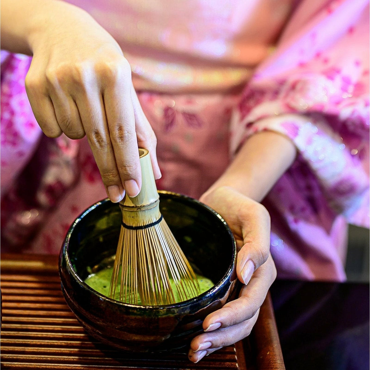 Wilderness Poets Ceremonial Grade Matcha Green Tea Powder styled on a table
