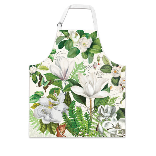 Michel Design Works Magnolia Petals cotton chef apron with magnolia blossoms on green foliage