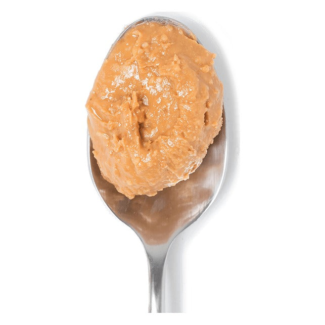 Close-up of a spoonful of Big Spoon Roasters Peanut Butter with Wildflower Honey