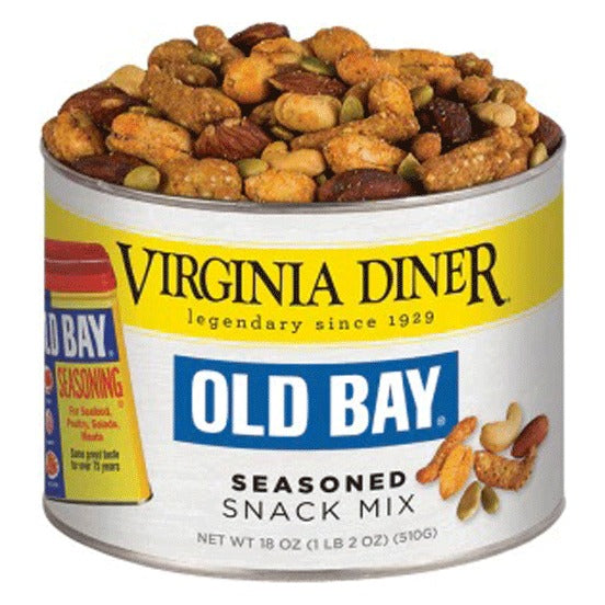 Virginia Diner Old Bay Seasoned Snack Mix 18 oz tin with yellow label band and Old Bay logo, filled with seasoned peanuts, almonds, pumpkin seeds and sesame sticks; label reads Net Wt 18 oz (1 lb 2 oz) (510 g)