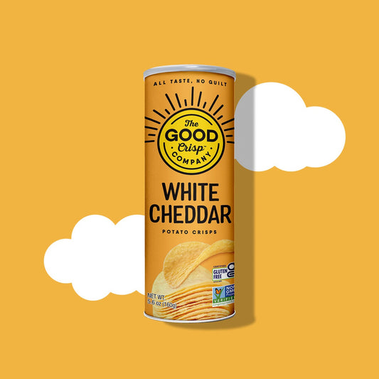 The Good Crisp Company White Cheddar Potato Crisps 5.6 oz (160 g) orange canister, front label with gluten-free and Non-GMO marks, on a yellow background