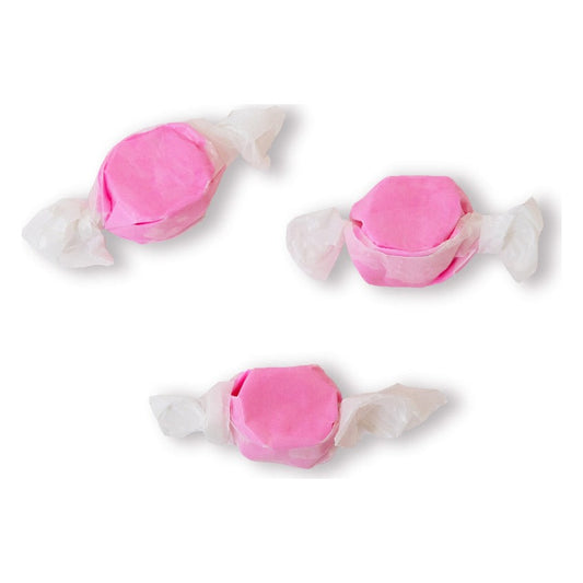 Three wrapped pieces of Sweet's Bubblegum taffy in light pink on a white background