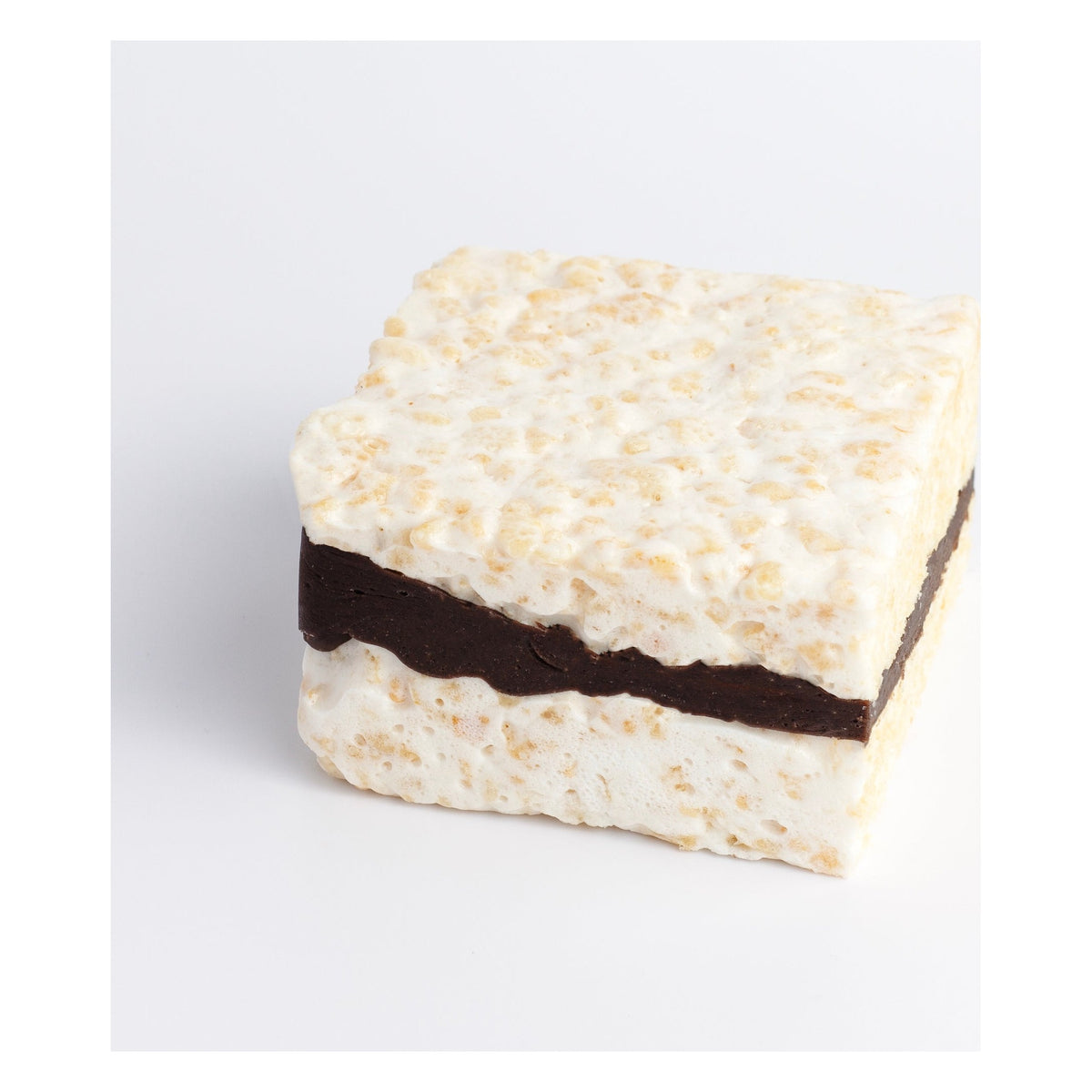 Peanut Butter & Chocolate Crispycake on a white background with a dark chocolate and peanut butter layer through the middle