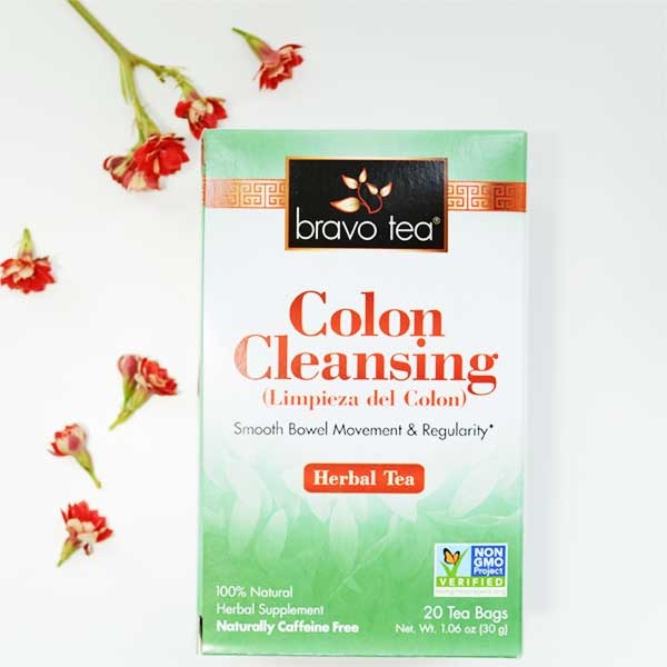 Bravo Colon Cleansing Herbal Tea box on a white surface with small red flowers