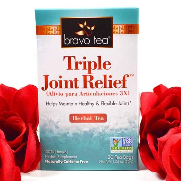 Bravo Triple Joint Relief Herbal Tea box standing between red roses