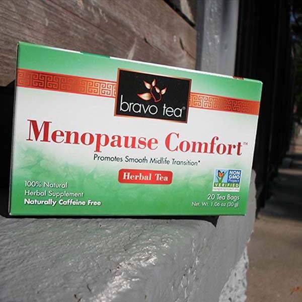 Bravo Tea Menopause Comfort box lying on its side on a stone ledge outdoors