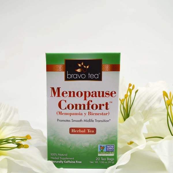 Bravo Tea Menopause Comfort box standing among white lilies
