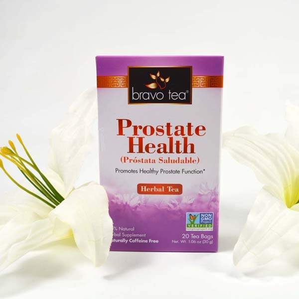 Bravo Tea Prostate Health box standing between white lilies