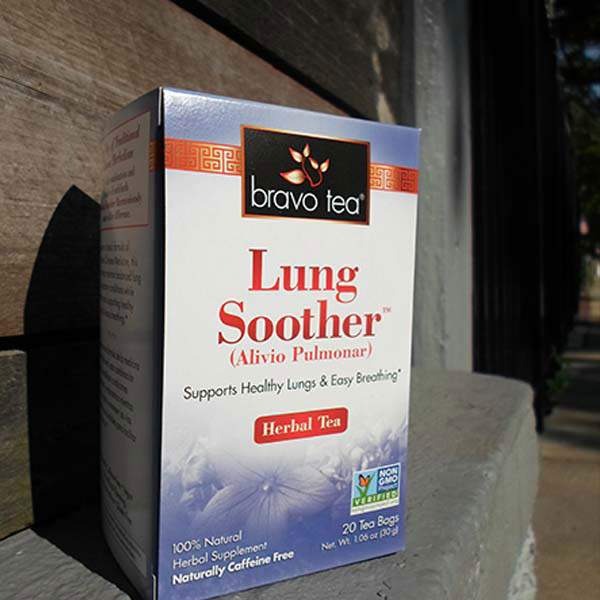 Bravo Tea Lung Soother box standing upright on a stone ledge outdoors
