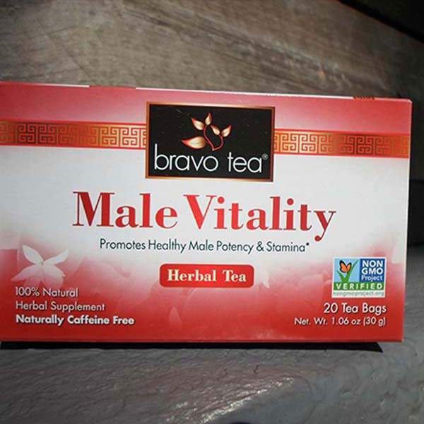 Bravo Tea Male Vitality box lying on its side on weathered wood