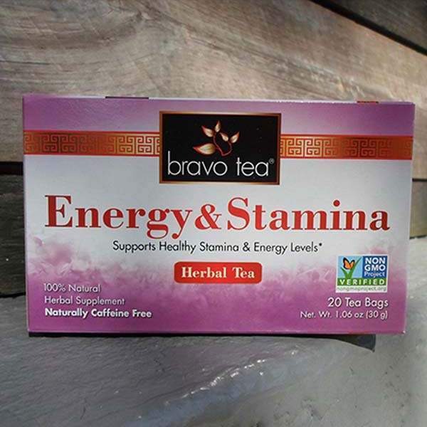 Bravo Tea Energy & Stamina box lying on its side on weathered wood