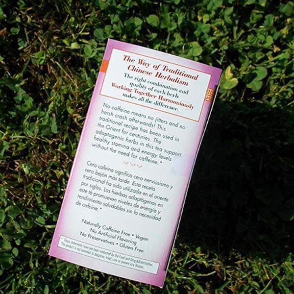 Side panel of the Energy & Stamina box with English and Spanish text, lying on grass