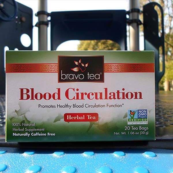 Bravo Tea Blood Circulation box on a blue perforated metal park bench