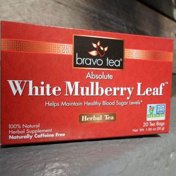 Bravo Tea Absolute White Mulberry Leaf box, front panel with 20 tea bags and Net Wt. 1.06 oz, on weathered wood boards