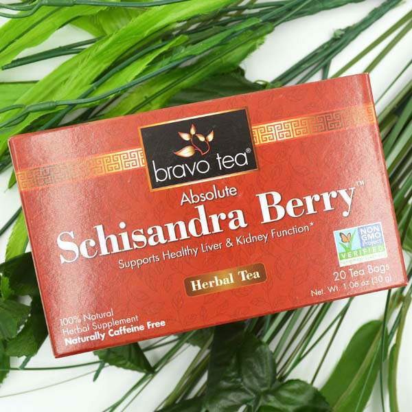 Bravo Tea Absolute Schisandra Berry box angled across green fern fronds