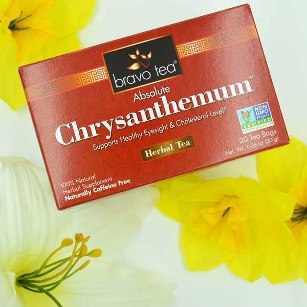 Bravo Tea Absolute Chrysanthemum box angled across white and yellow flowers