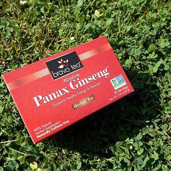 Bravo Tea Absolute Panax Ginseng box lying on its side on green clover