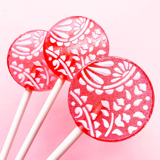 Popette of Pendulum Strawberry Cream Fruit Cream Lollipops with Candied Vanilla Frosting
