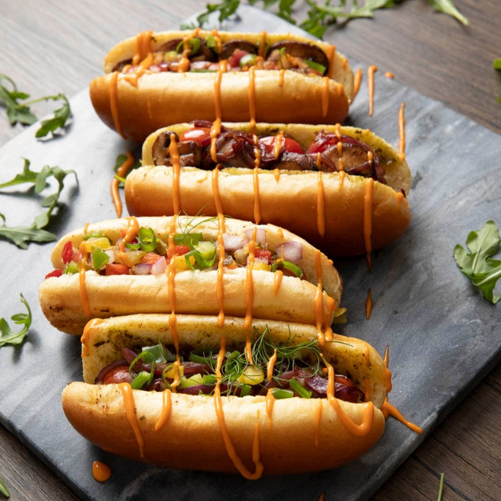 Bakerly Brioche Buns styled on a table