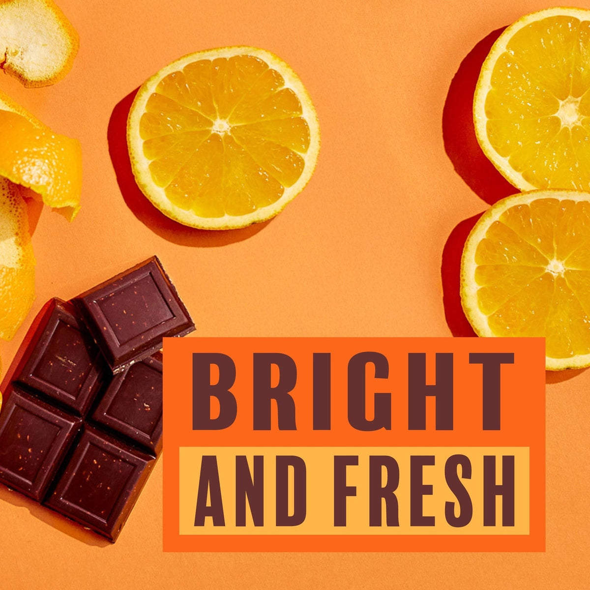 Beyond Good Orange Zest 73% Uganda Dark Chocolate Bar styled on a table