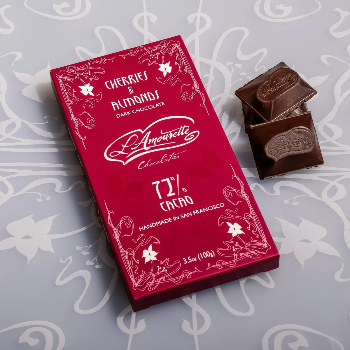 L'Amourette Chocolat 72% Dark Chocolate with Dried Cherries & Salted Almonds Bar, front of the package