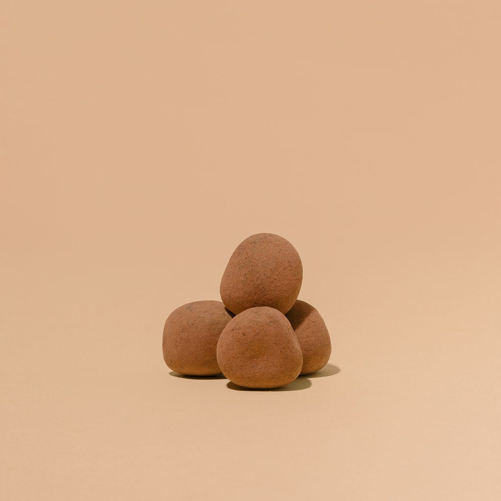 Close-up of Monsoon Chocolate Dark Chocolate Covered Ginger as it comes out of the package