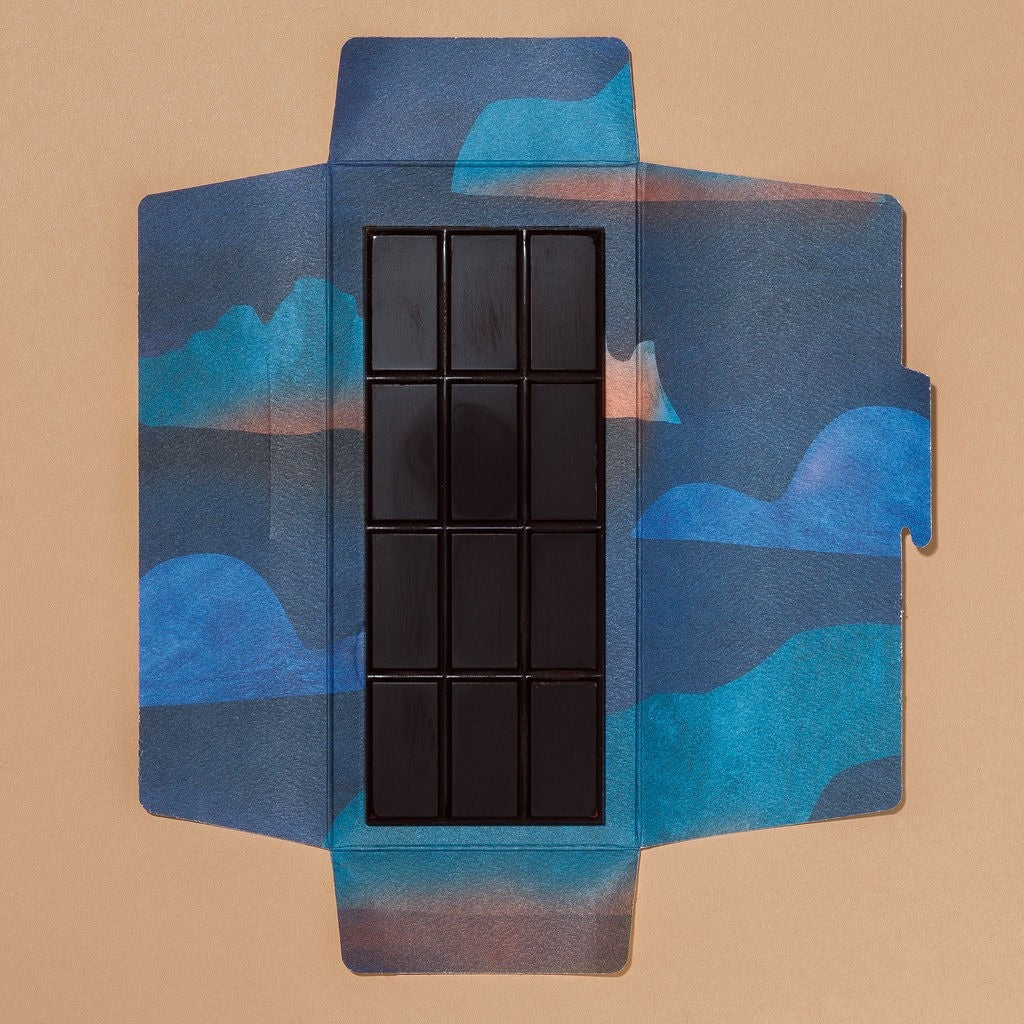 Close-up of Monsoon Chocolate Esmeraldas Ecuador 75% Dark Chocolate Bar as it comes out of the package