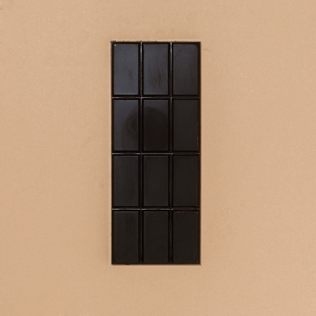 Close-up of Monsoon Chocolate Esmeraldas Ecuador 75% Dark Chocolate Bar as it comes out of the package