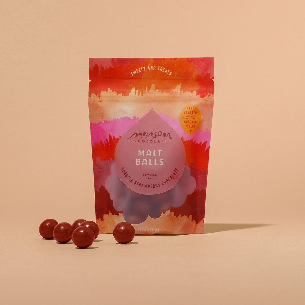 Close-up of Monsoon Chocolate Roasted Strawberry Chocolate Covered Malt Balls as it comes out of the package