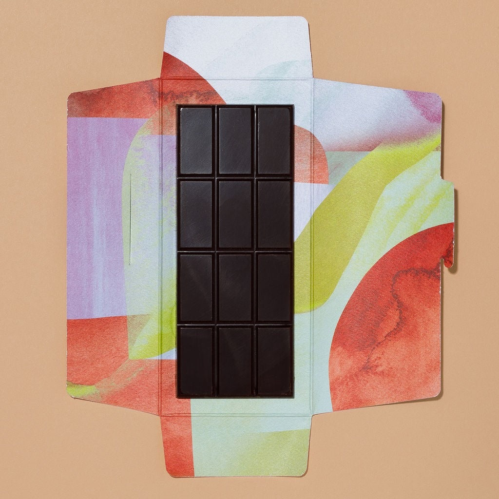 Close-up of Monsoon Chocolate Tranquilidad Bolivia 73% Dark Chocolate Bar as it comes out of the package