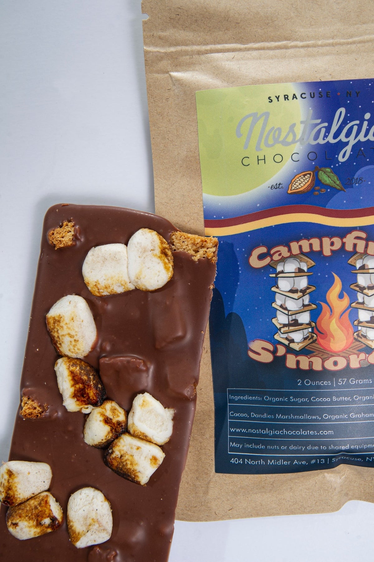 Close-up of Nostalgia Chocolates S'mores Milk Chocolate Bar as it comes out of the package
