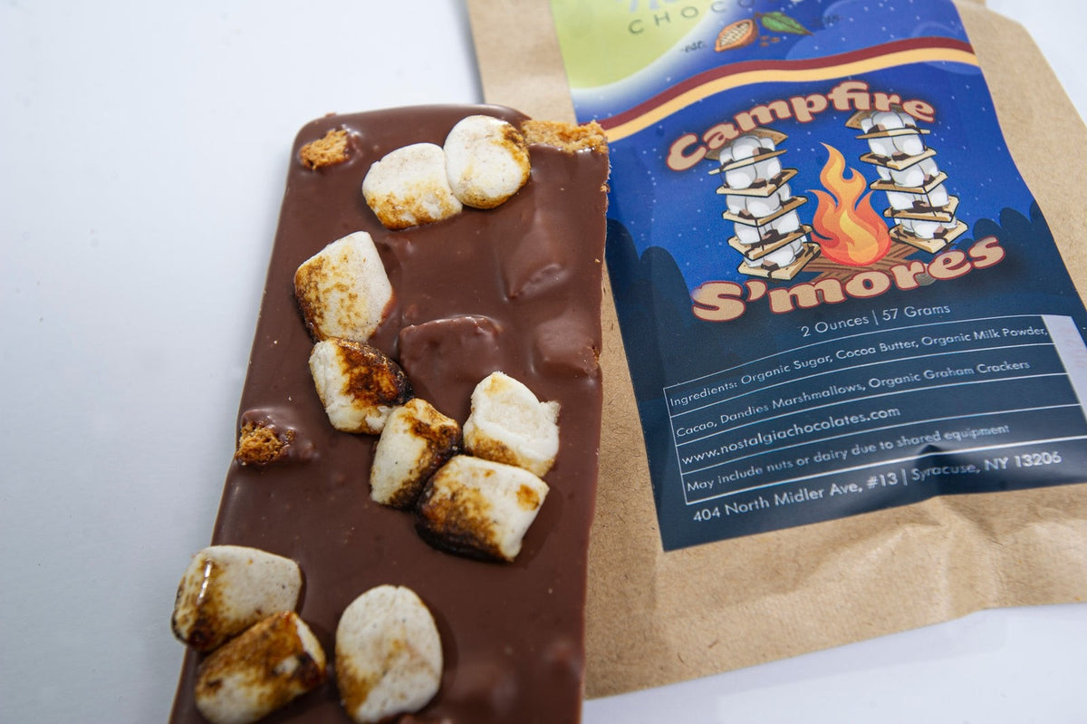 Close-up of Nostalgia Chocolates S'mores Milk Chocolate Bar as it comes out of the package