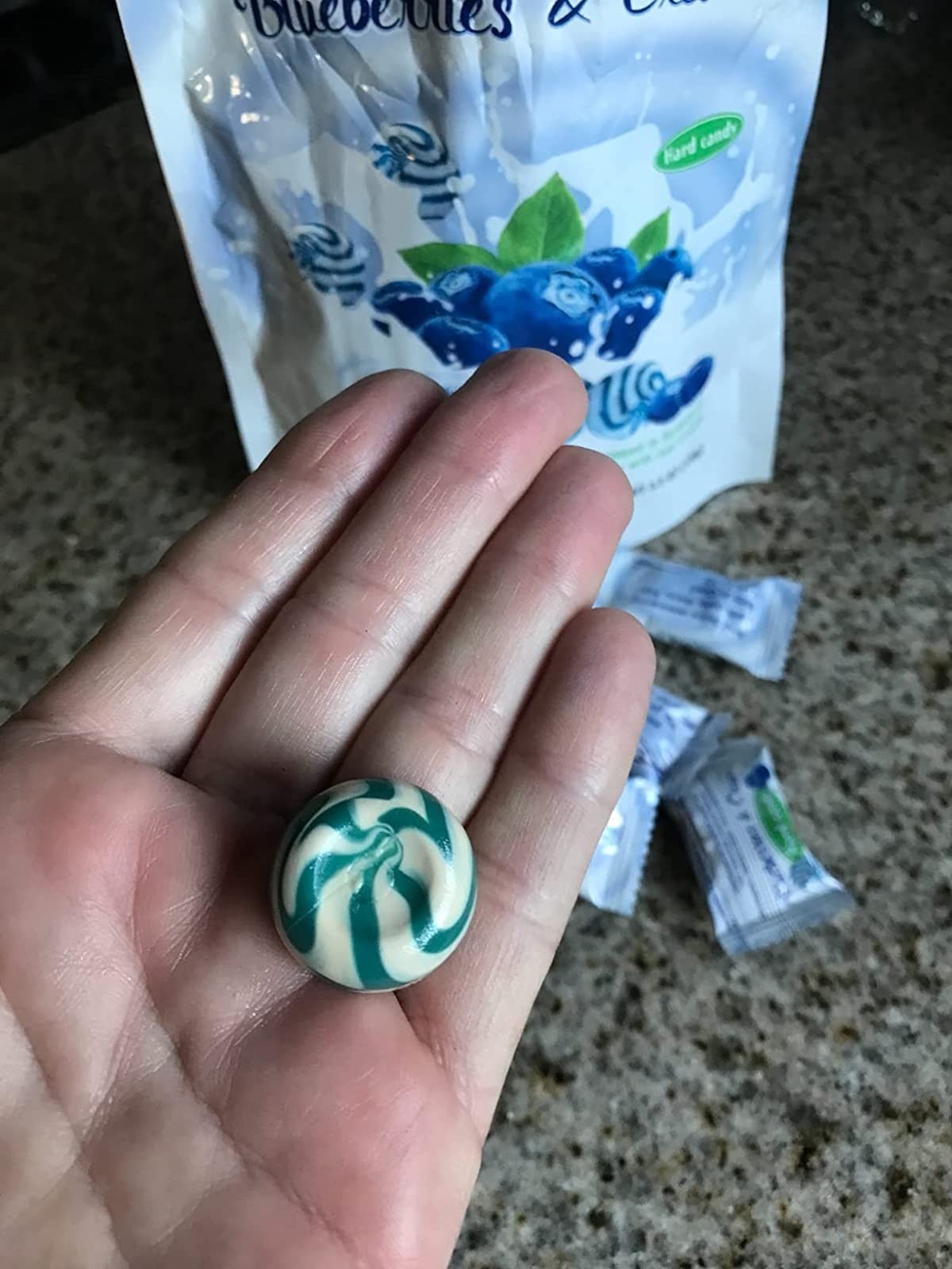 Scripture Candy Blueberries & Cream Hard Candy shown in use