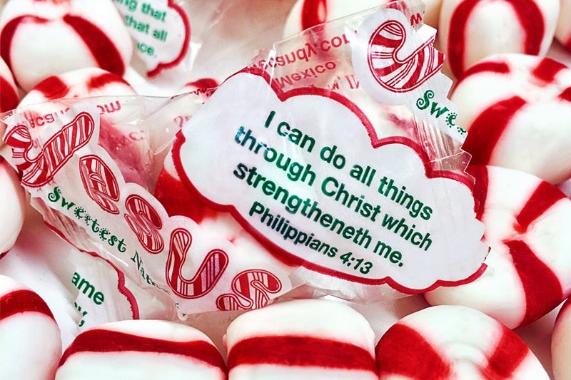 Close-up of Scripture Candy Jesus Our Shining Hope Star Tin with Soft Peppermints as it comes out of the package