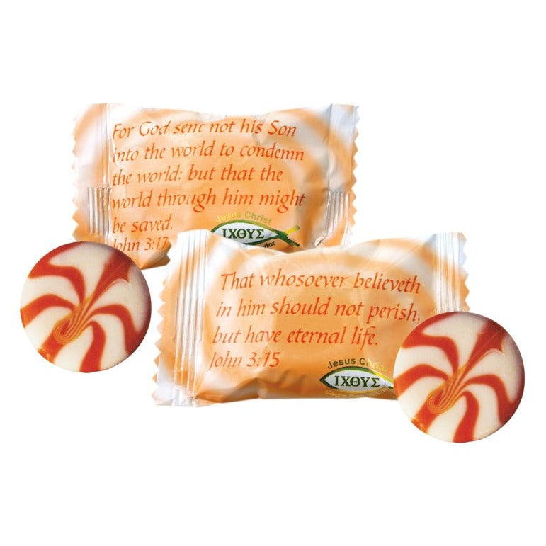 Close-up of Scripture Candy Orange & Cream Hard Candy as it comes out of the package