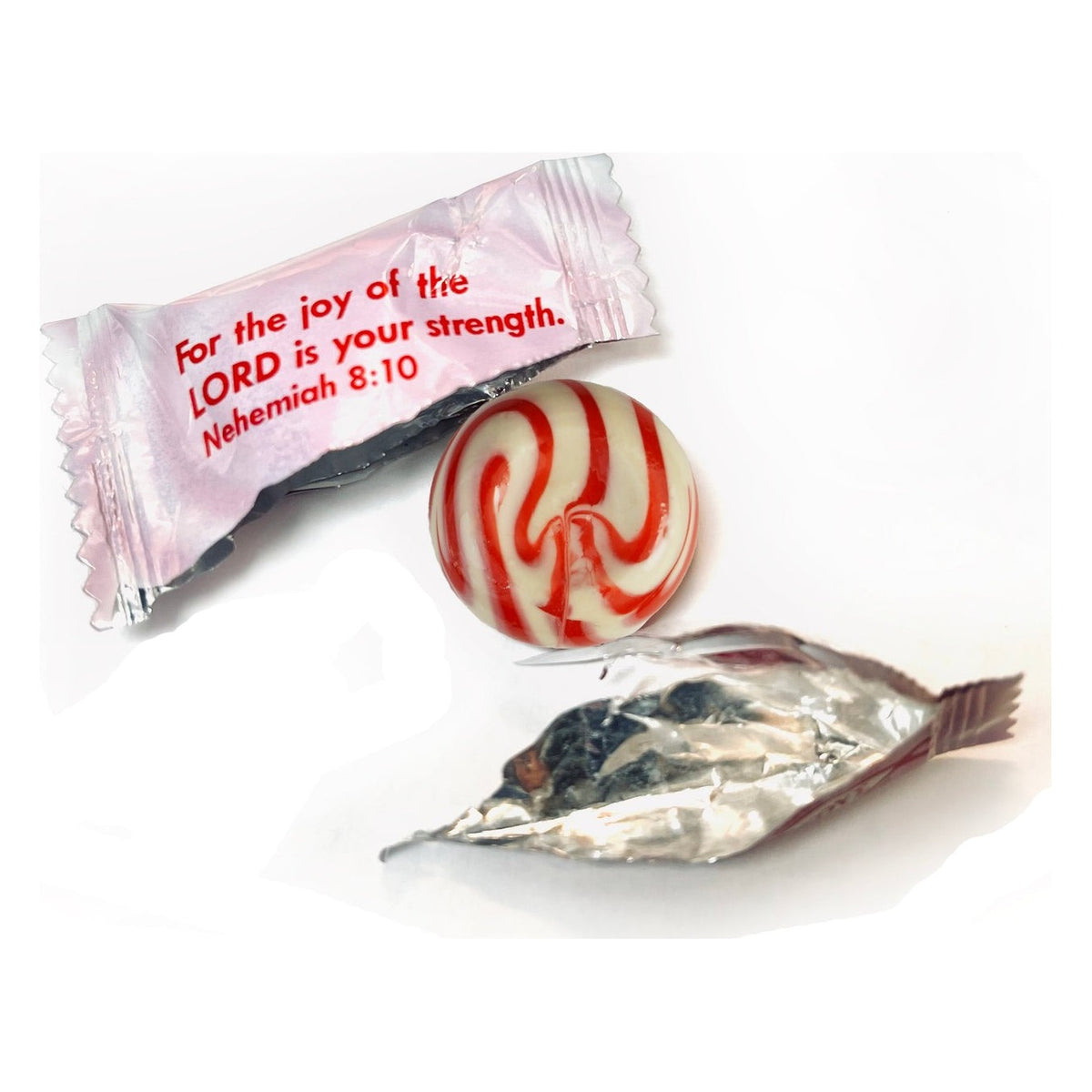 Close-up of Scripture Candy Strawberry & Cream Hard Candy as it comes out of the package
