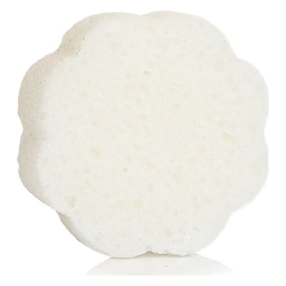 Close-up of Spongellé Bulgarian Rose Daisy Spongette as it comes out of the package