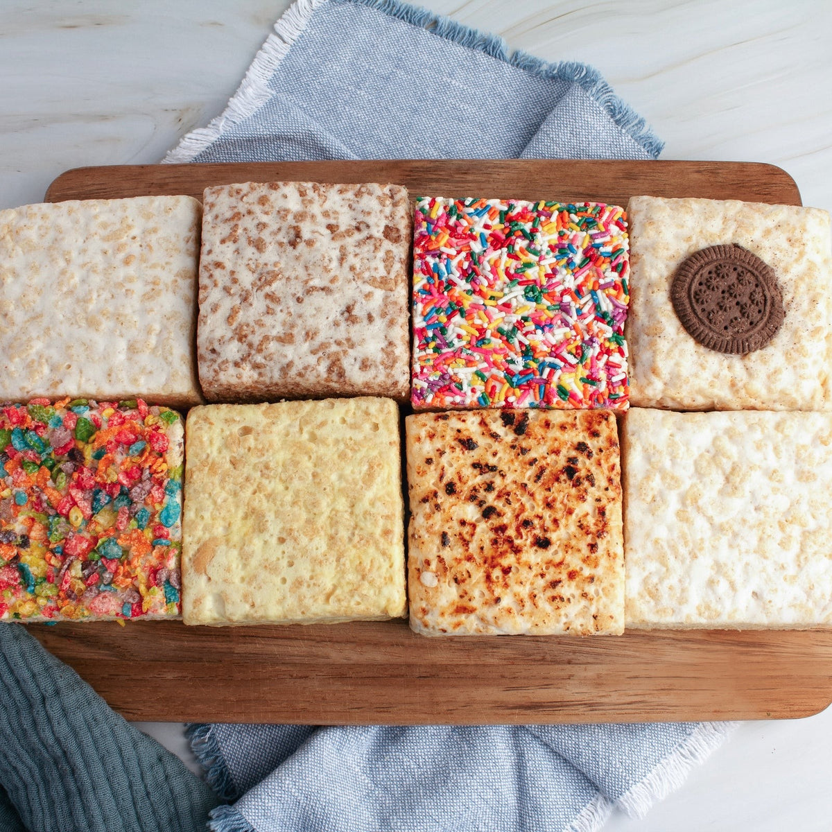 The Crispery Cocoa Crispy Crispycake, Marshmallow Crispy Rice Treat styled on a table