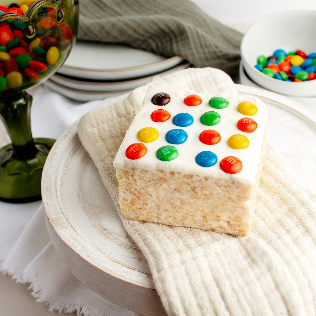 The Crispery Chocolate Candy Buttons Crispycake, Marshmallow Crispy Rice Treat styled on a table
