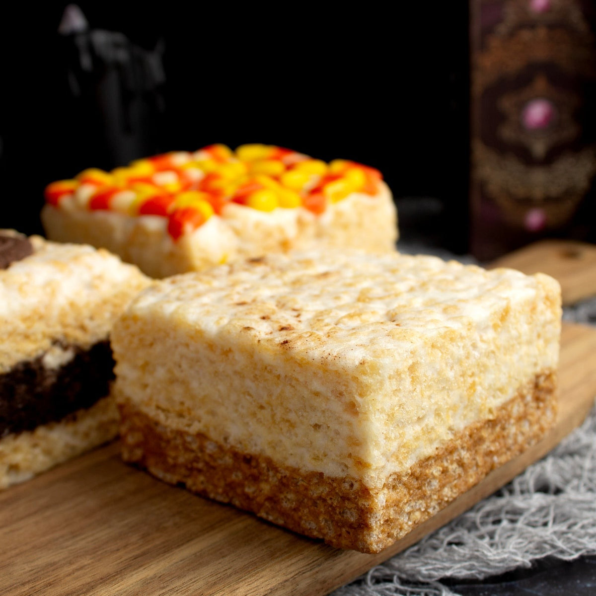 The Crispery Pumpkin Spice Crispycake, Marshmallow Crispy Rice Treat styled on a table