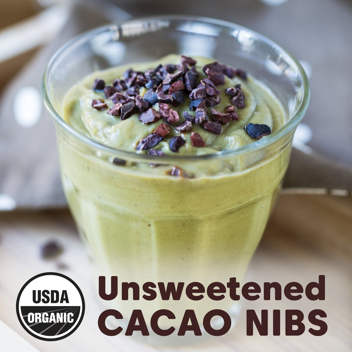Wilderness Poets Peruvian Criollo Cacao Nibs, Unsweetened styled on a table